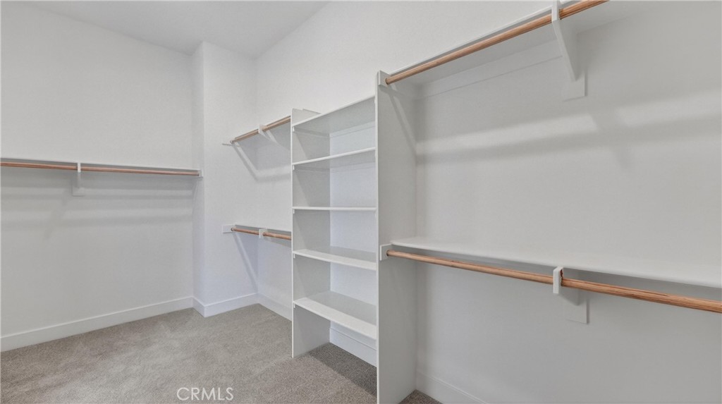 107 Pansy Irvine, CA 92618 - Photo 28 of 35 a view of walk in closet with empty racks