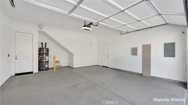 a view of empty room with ceiling fan