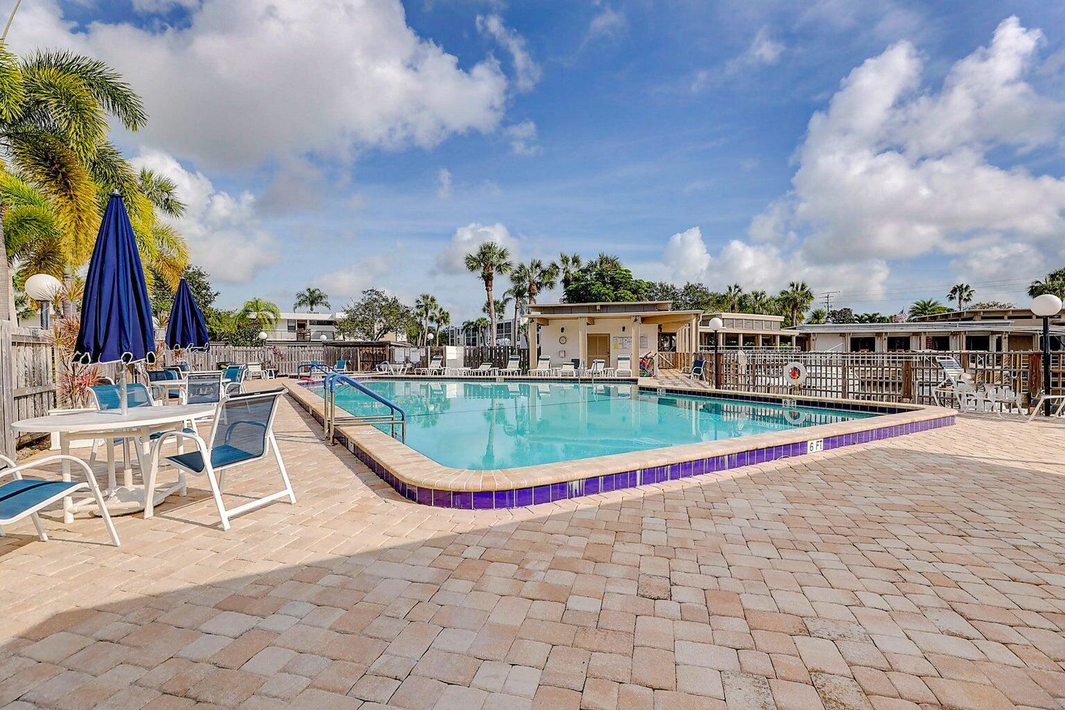 1950 Southwest Palm City Road, Unit 14304 Stuart, FL 34994 - Photo 25 of 54 pool deck 9-103