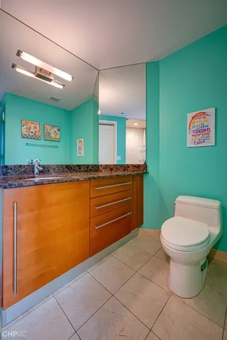 a bathroom with a toilet and a sink