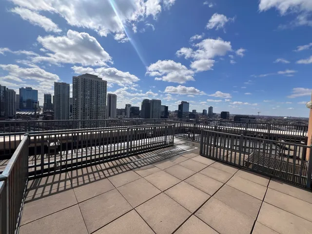 a view of a balcony with city view