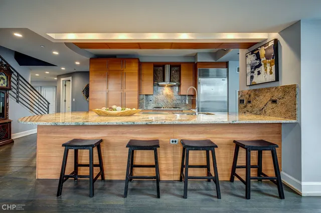 a bathroom with a sink and a large mirror