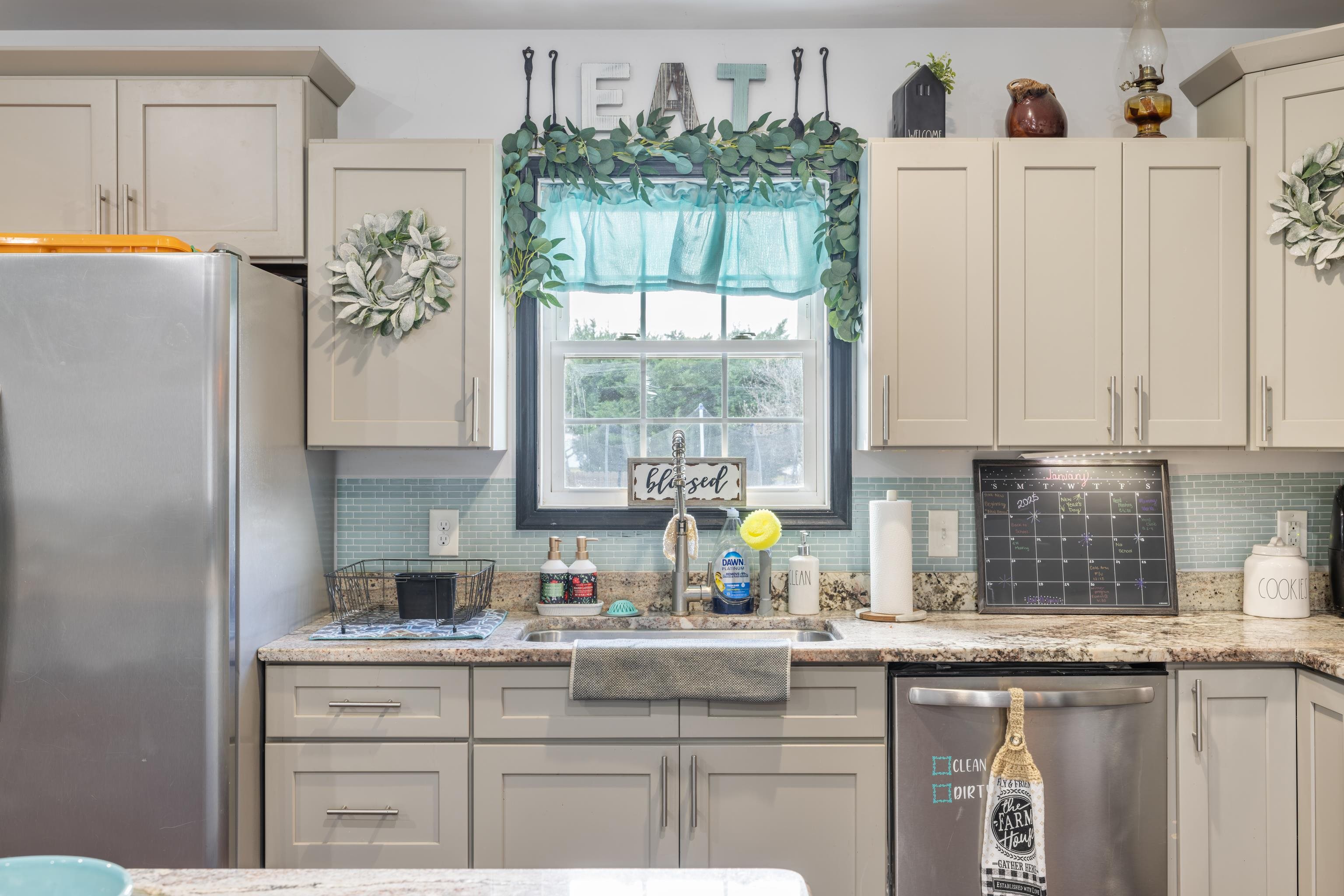 703 14th Street Grottoes, VA 24441 - Photo 11 of 51 a kitchen with appliances a sink and cabinets