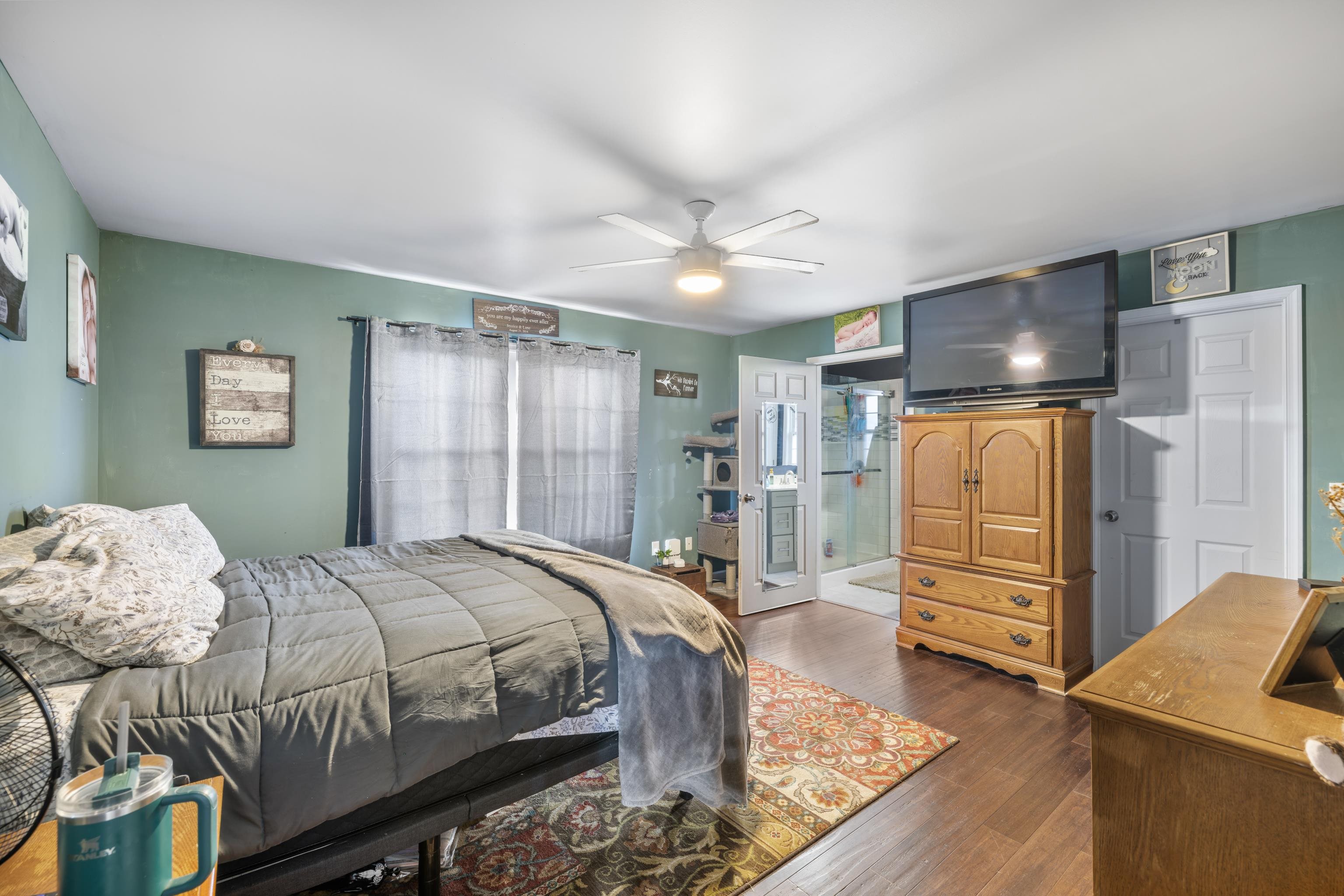 703 14th Street Grottoes, VA 24441 - Photo 16 of 51 a bedroom with a bed and a dresser