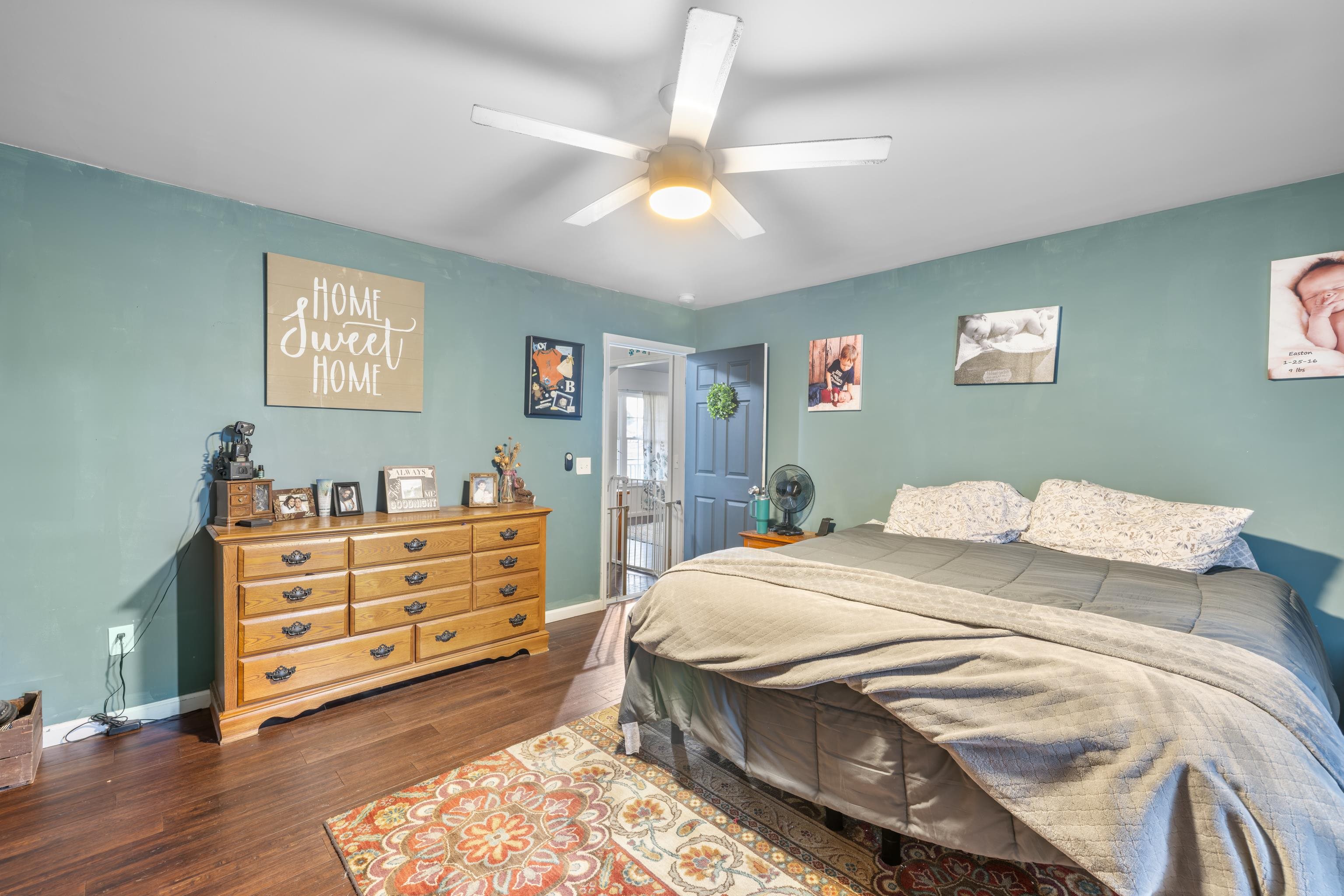 703 14th Street Grottoes, VA 24441 - Photo 17 of 51 a bedroom with a bed and a dresser
