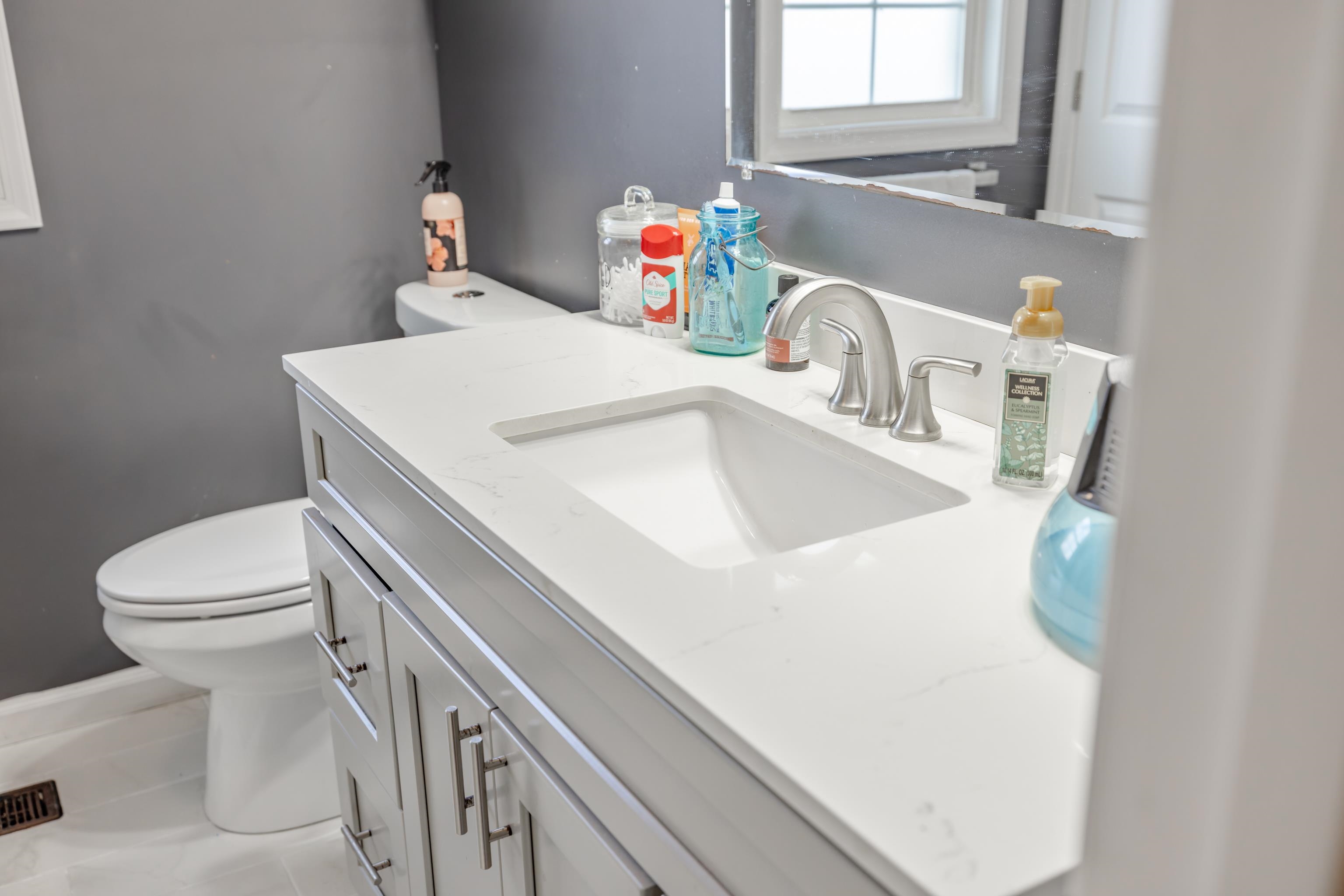 703 14th Street Grottoes, VA 24441 - Photo 20 of 51 a bathroom with a sink and a toilet