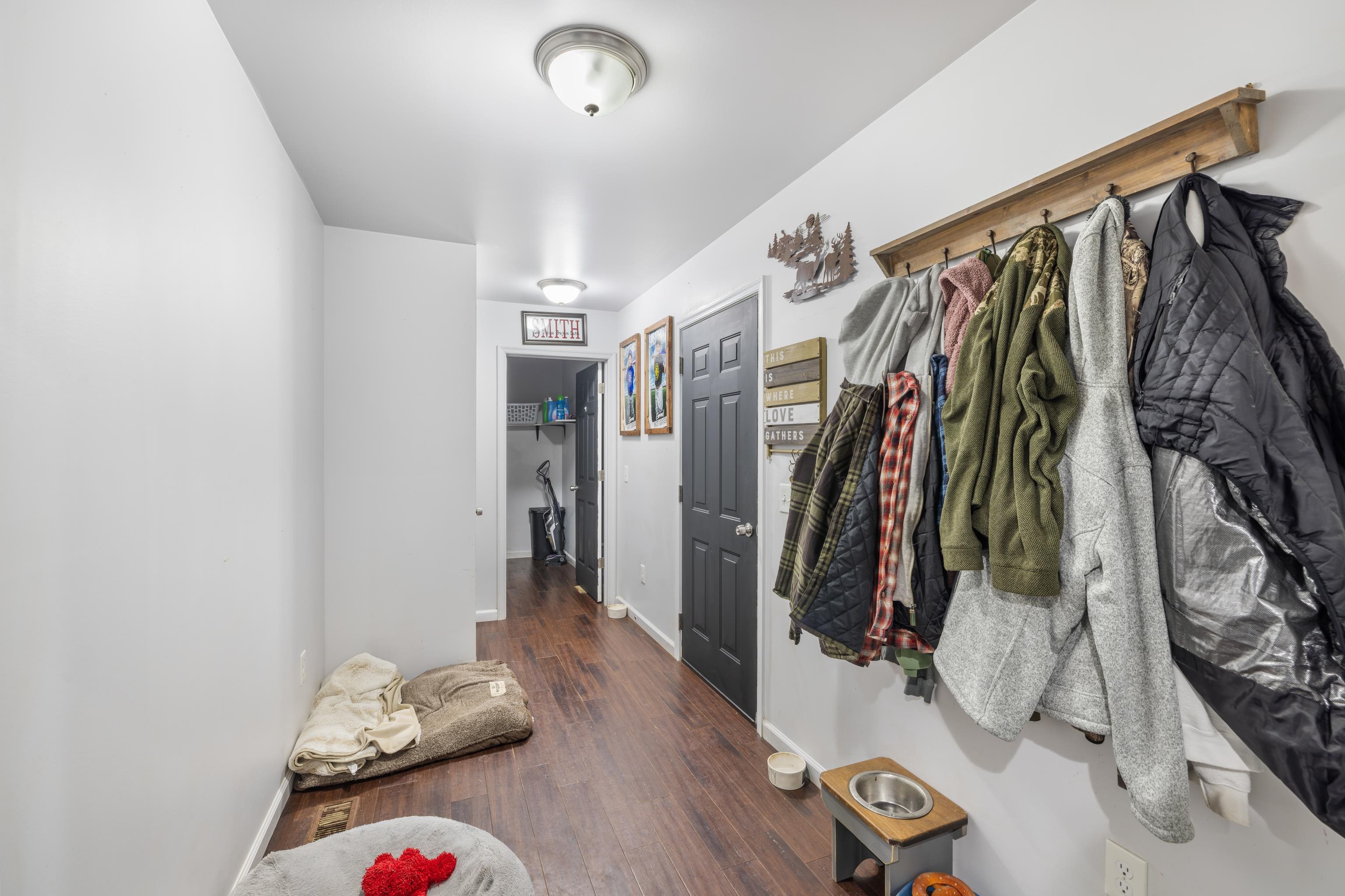 703 14th Street Grottoes, VA 24441 - Photo 21 of 51 a view of walk in closet with clothes