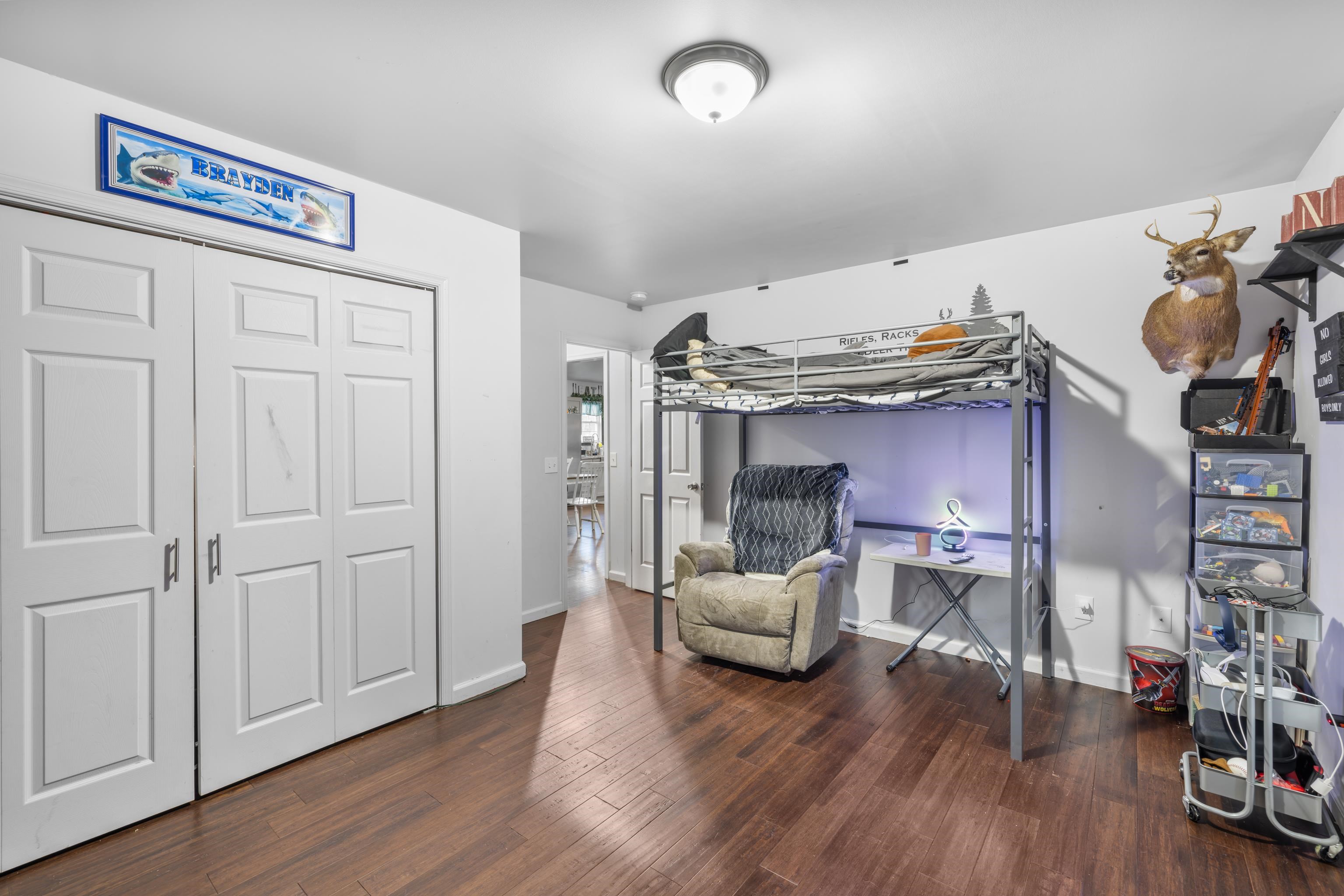 703 14th Street Grottoes, VA 24441 - Photo 24 of 51 a living room with furniture and a wooden floor