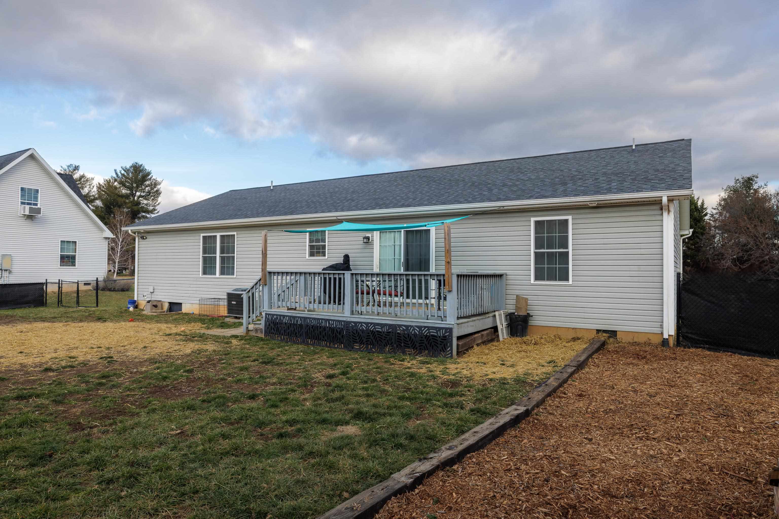 703 14th Street Grottoes, VA 24441 - Photo 36 of 51 front view of a house with a yard