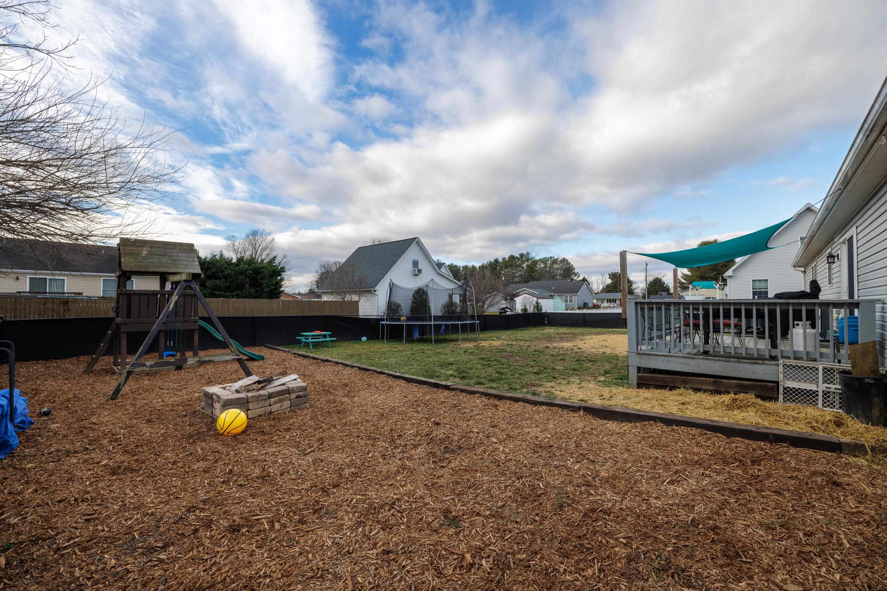 703 14th Street Grottoes, VA 24441 - Photo 37 of 51 a view of a house with swimming pool and sitting area
