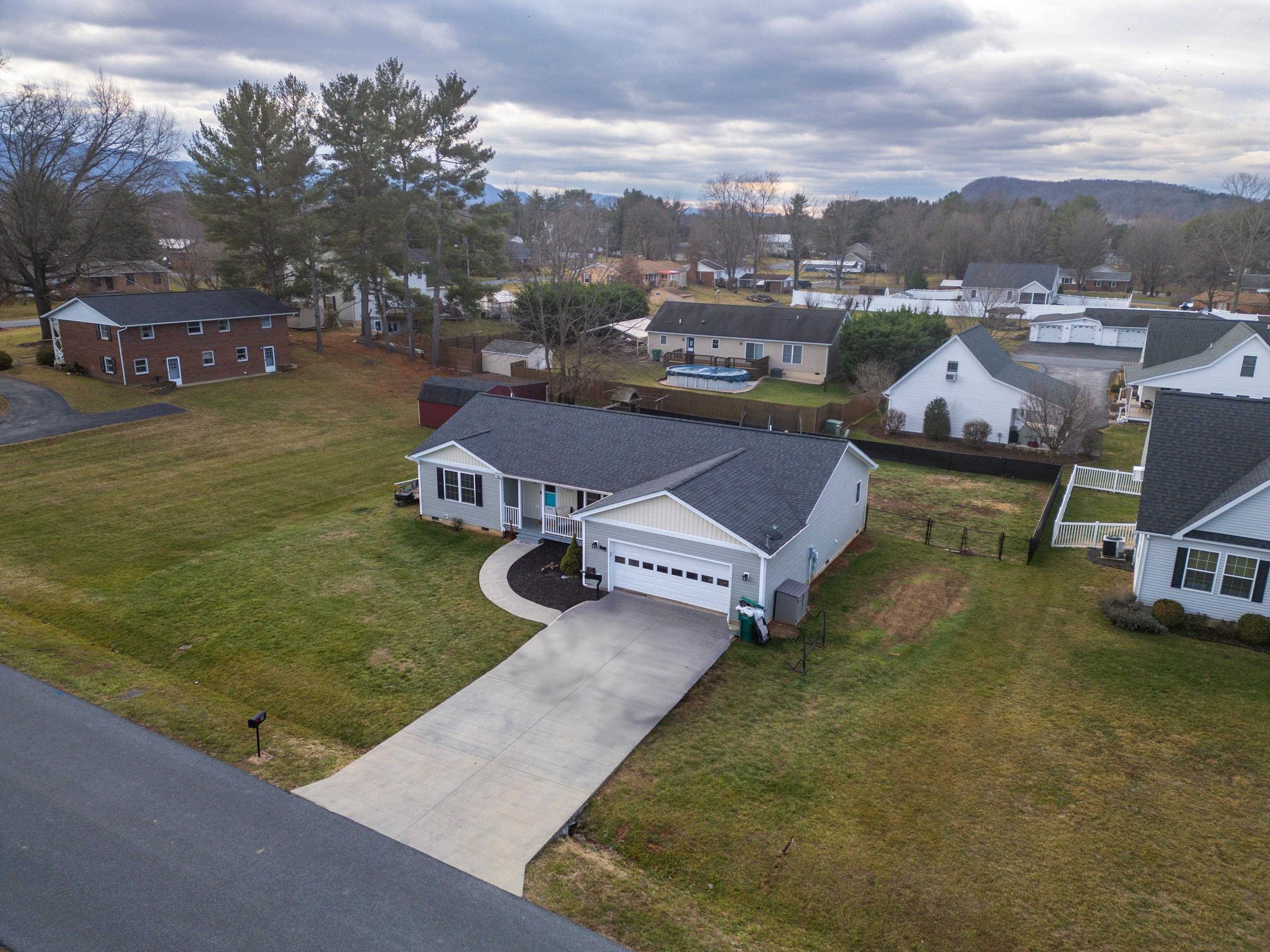 703 14th Street Grottoes, VA 24441 - Photo 40 of 51 an aerial view of a house with garden space