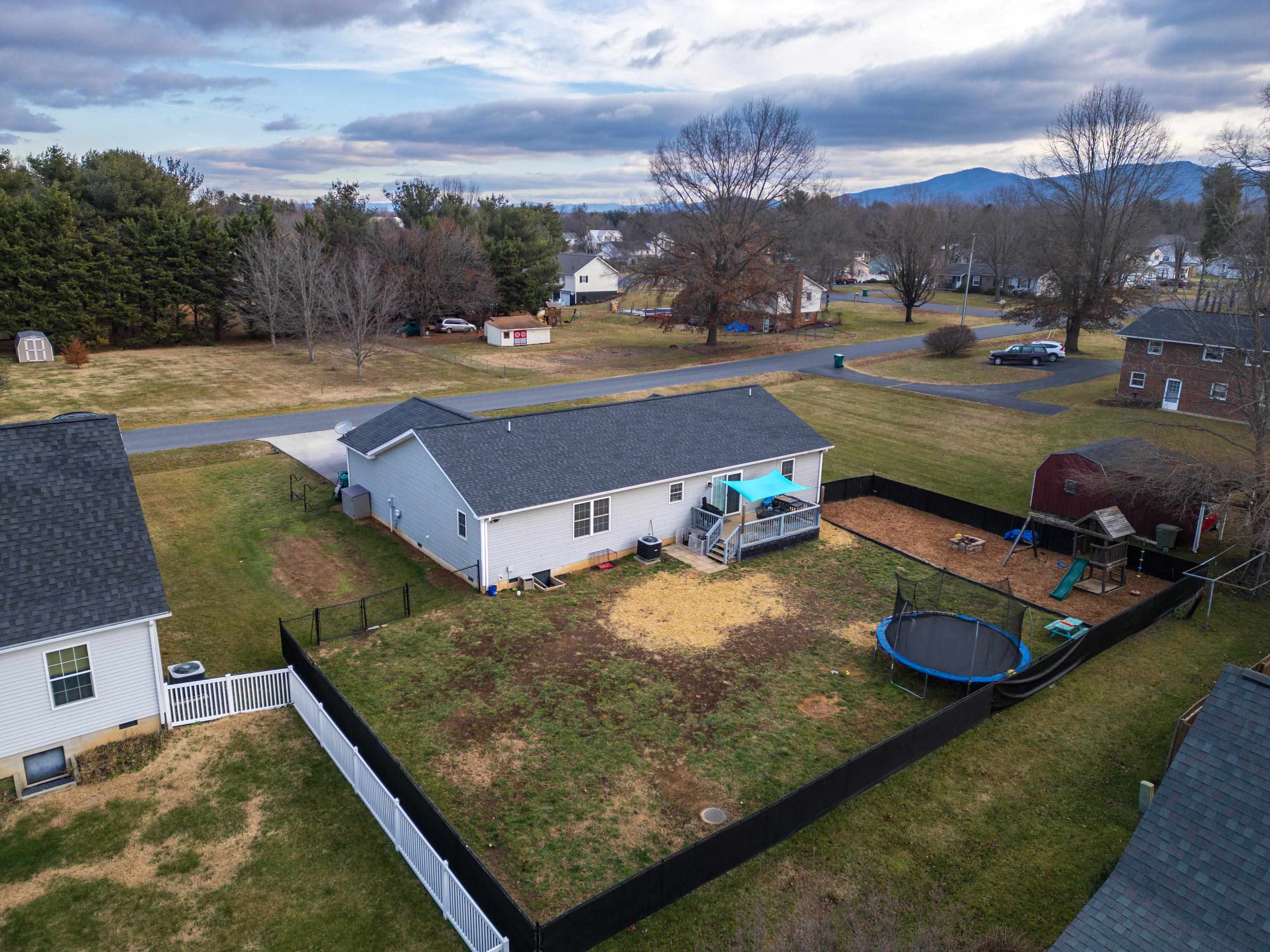 703 14th Street Grottoes, VA 24441 - Photo 41 of 51 a view of a backyard with sitting area