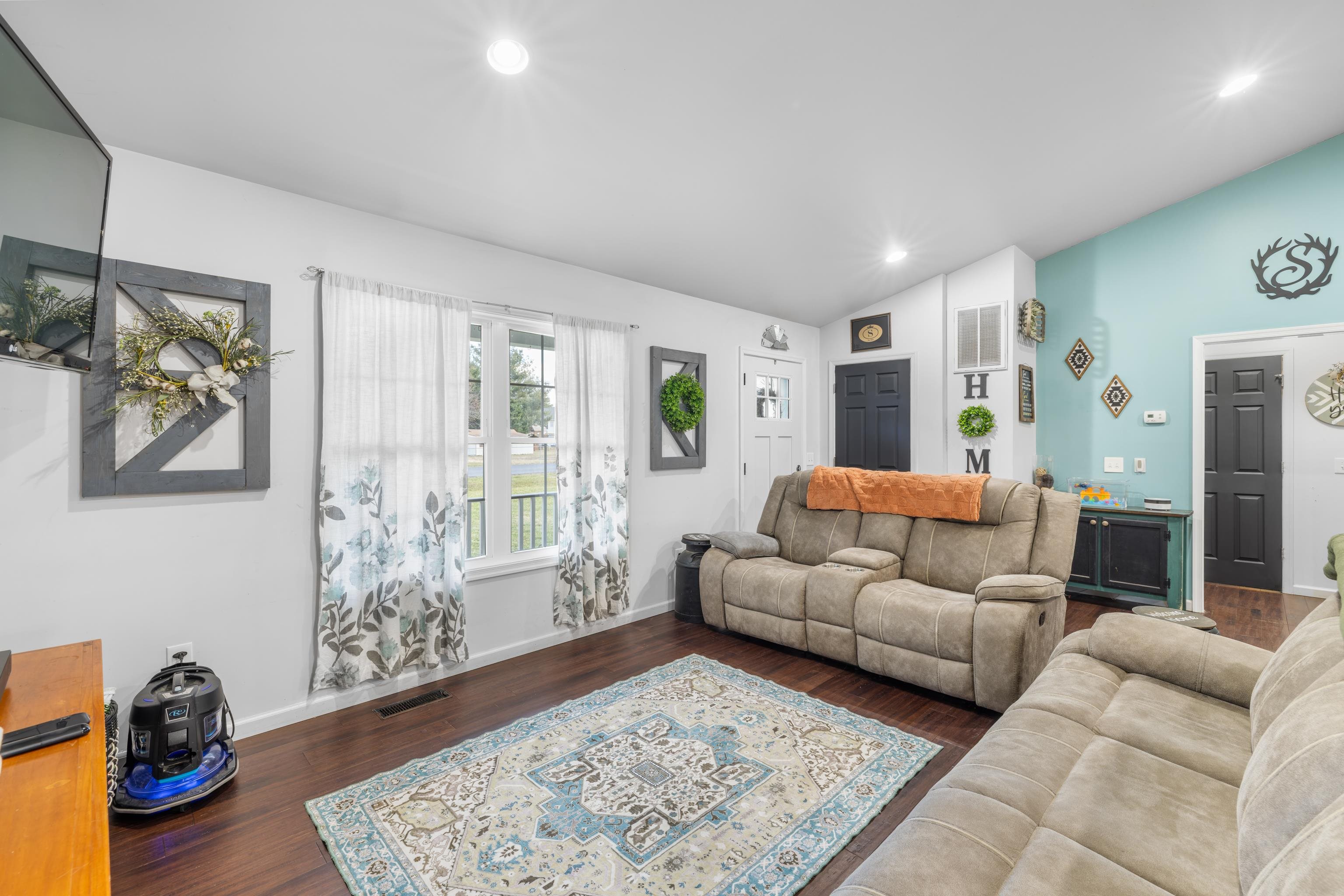 703 14th Street Grottoes, VA 24441 - Photo 5 of 51 a living room with furniture and a rug