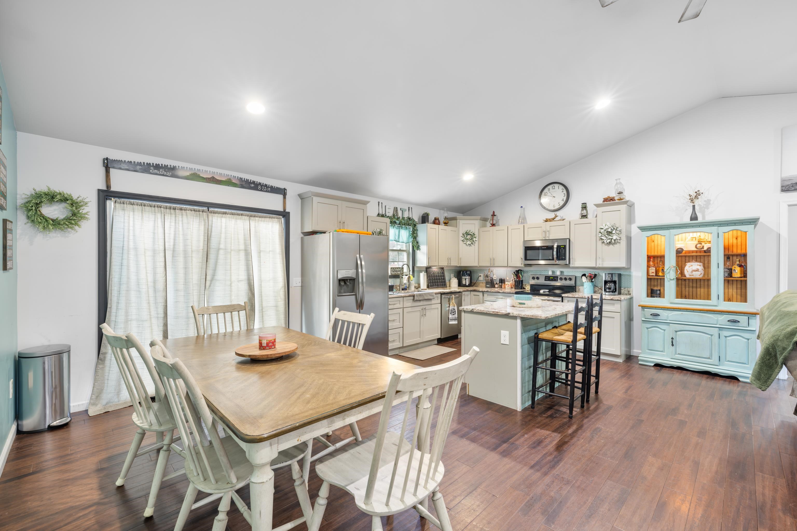 703 14th Street Grottoes, VA 24441 - Photo 6 of 51 a view of a dining room with furniture and wooden floor