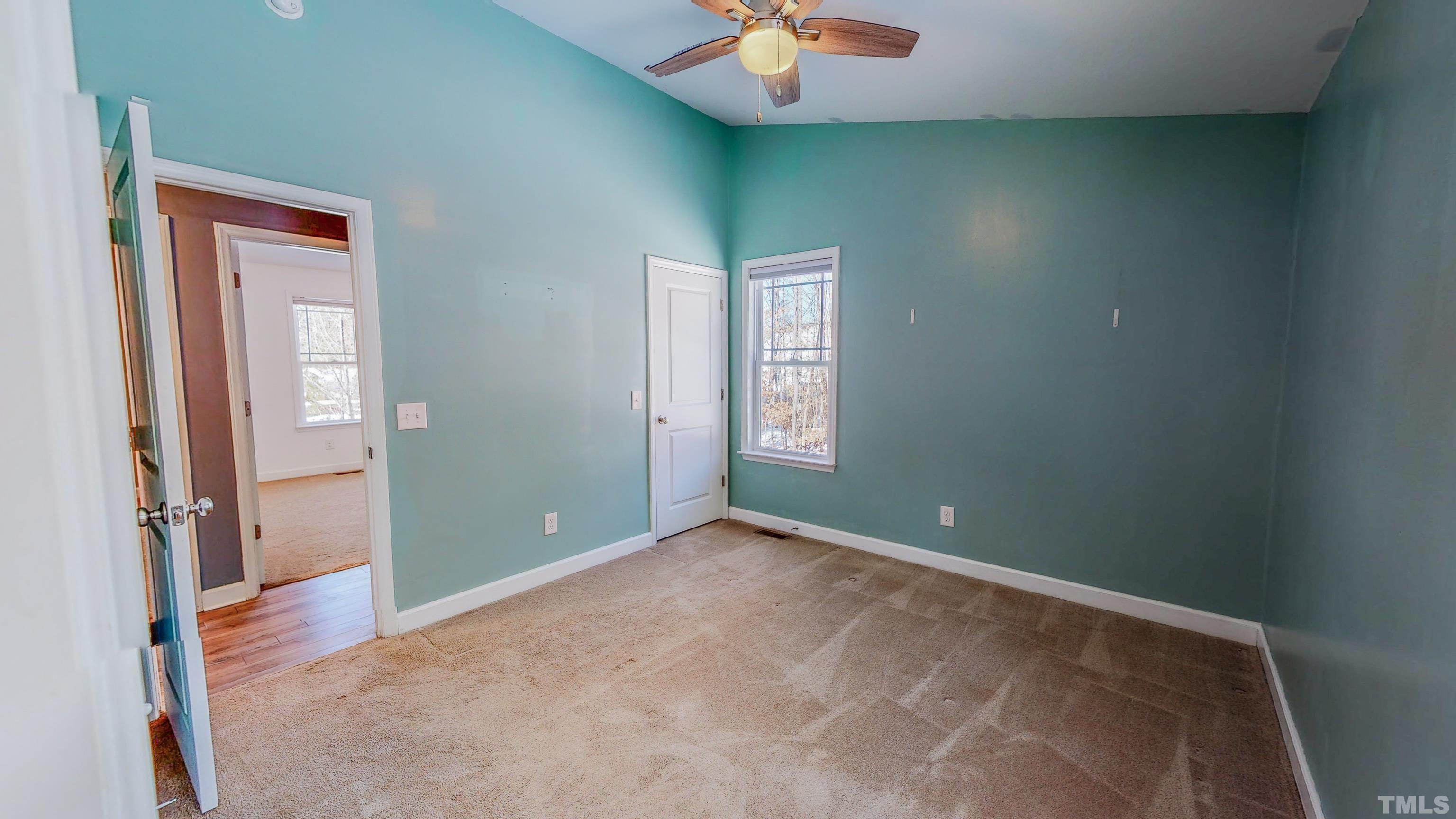45 Eli Court Roxboro, NC 27573 - Photo 15 of 36 an empty room with a mirror