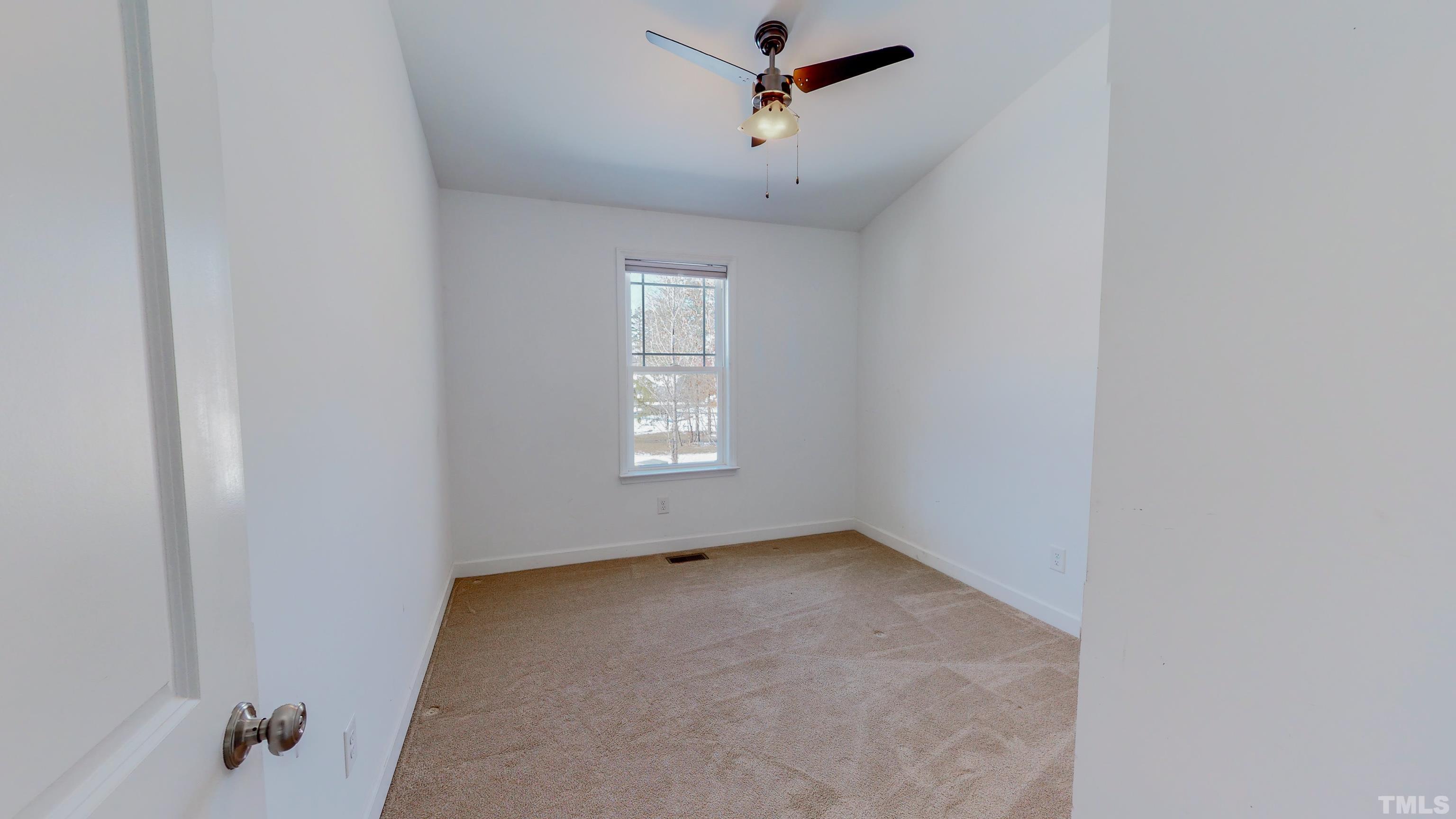 45 Eli Court Roxboro, NC 27573 - Photo 20 of 36 an empty room with windows