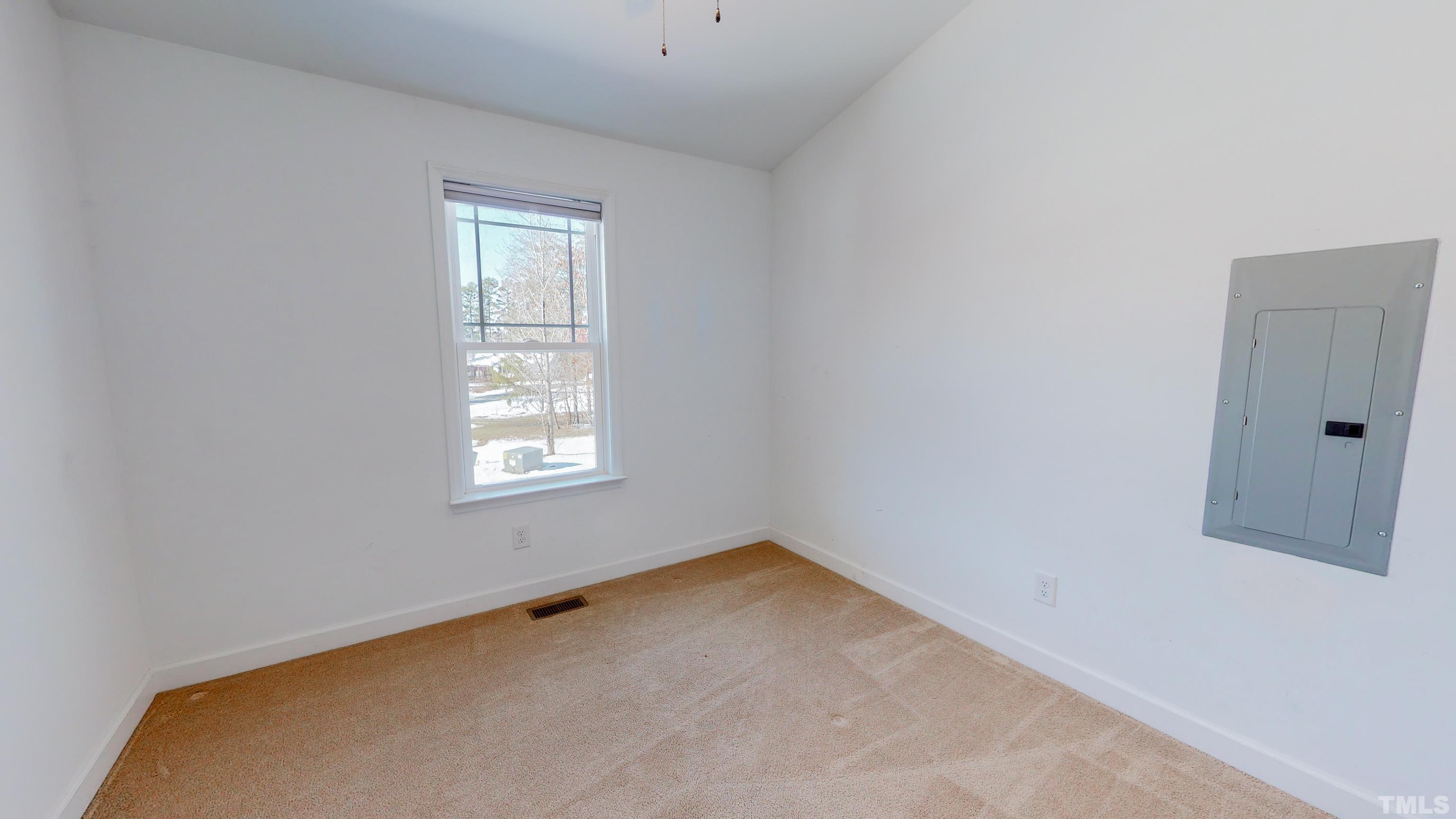 45 Eli Court Roxboro, NC 27573 - Photo 21 of 36 a view of a window in an empty room