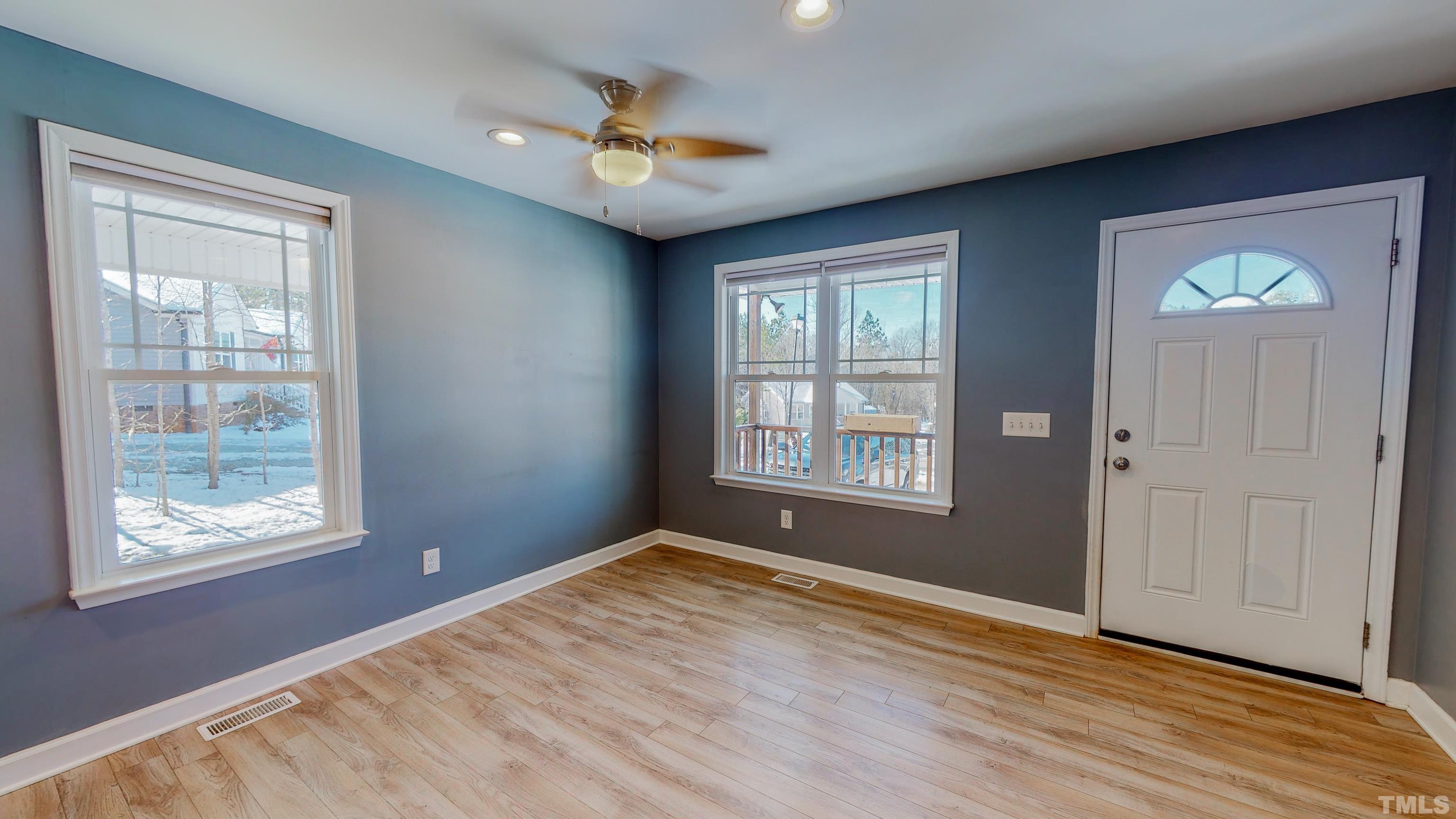 45 Eli Court Roxboro, NC 27573 - Photo 27 of 36 a view of empty room with wooden floor and fan
