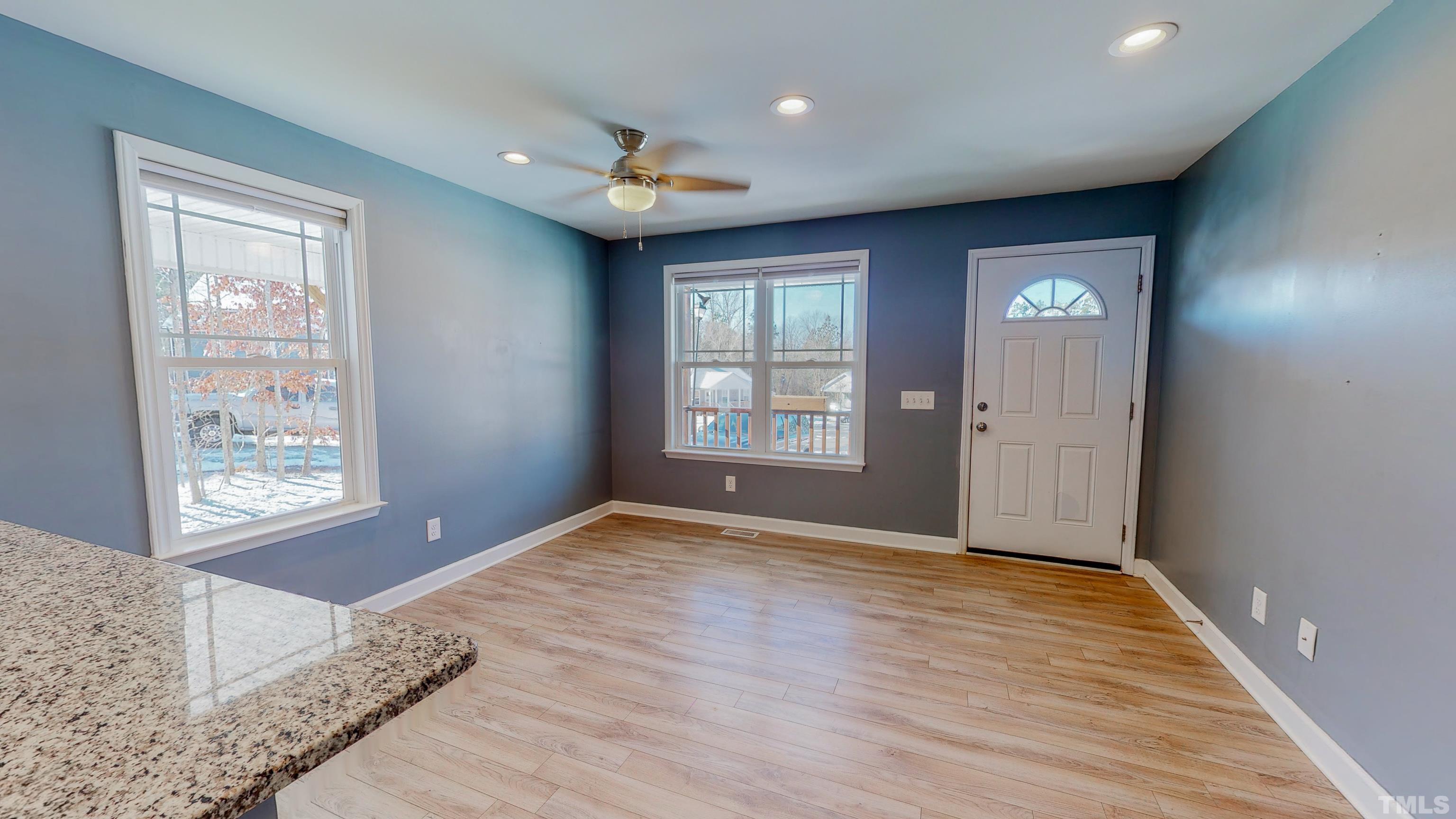 45 Eli Court Roxboro, NC 27573 - Photo 5 of 36 a view of an empty room and window