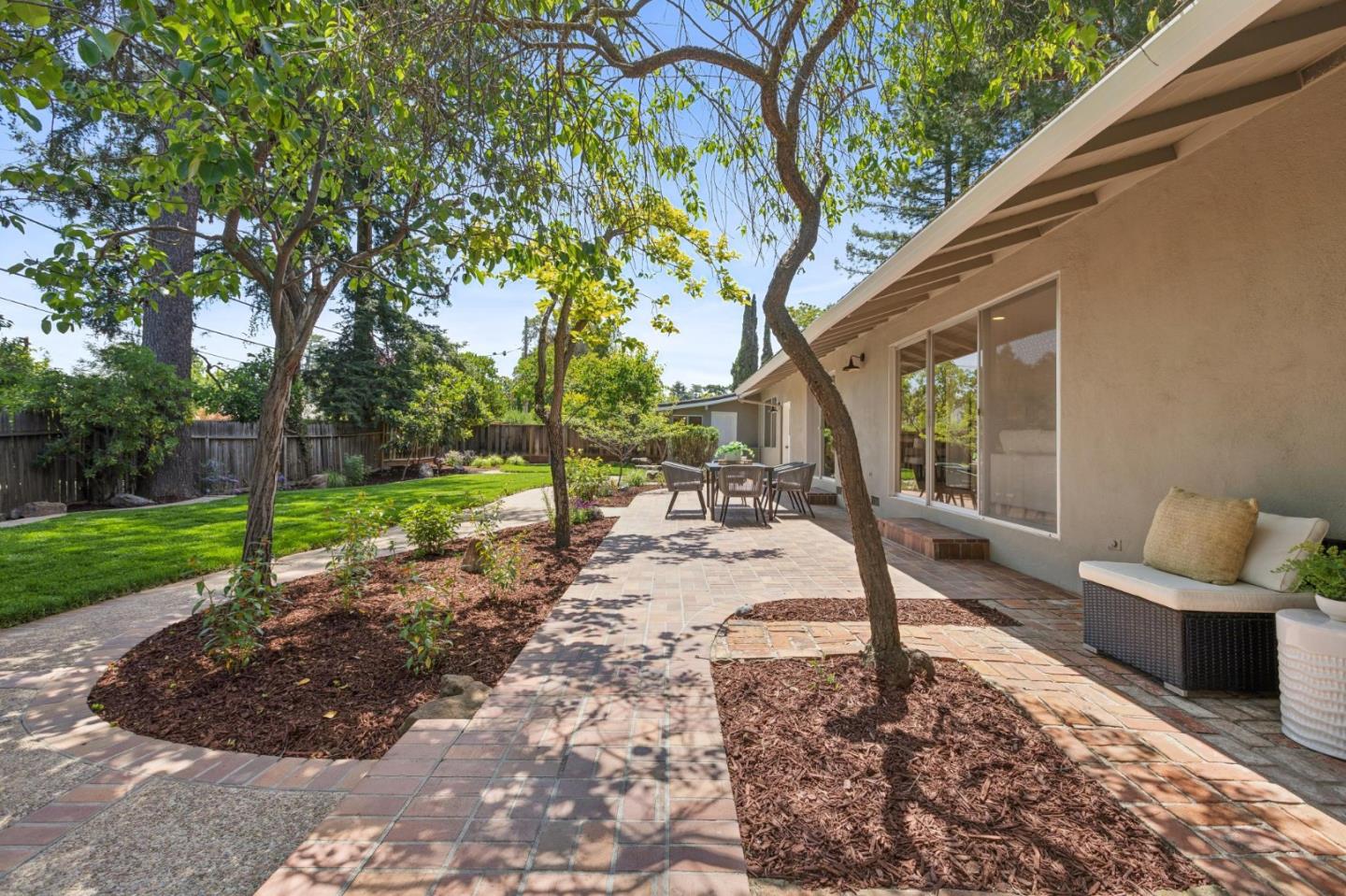 755 Santa Rita Avenue Los Altos, CA 94022 - Photo 47 of 50 a view of a sitting area with trees in the background