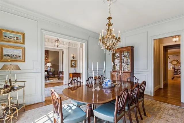 a kitchen with stainless steel appliances granite countertop a stove and cabinets