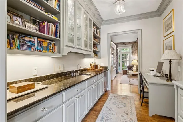 a living room with furniture or outdoor view and a chandelier