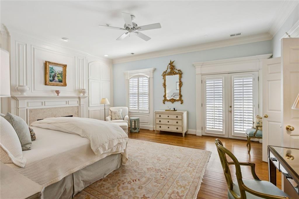 3005 Ranch Road Southeast Atlanta, GA 30339 - Photo 34 of 57 a spacious bedroom with a bed a table and chair