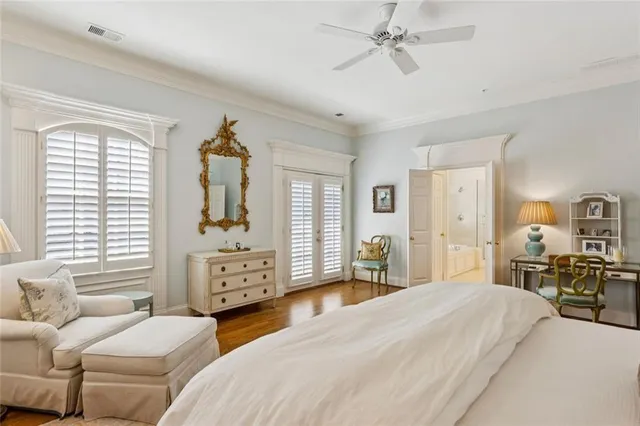a bed room with a bed and a book shelf