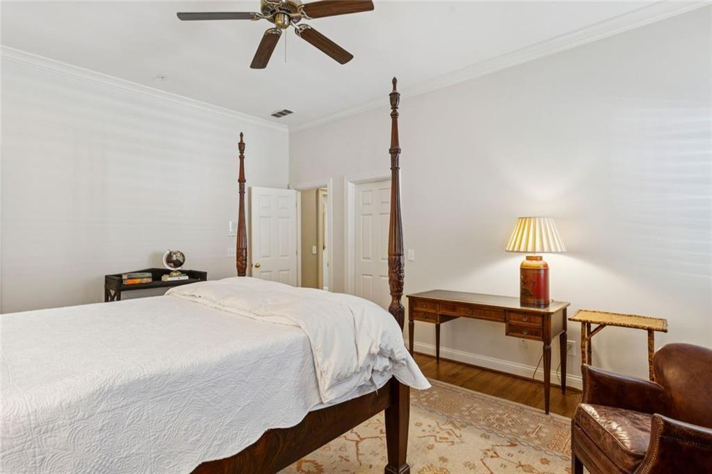 3005 Ranch Road Southeast Atlanta, GA 30339 - Photo 42 of 57 a bedroom with a bed a desk and chair