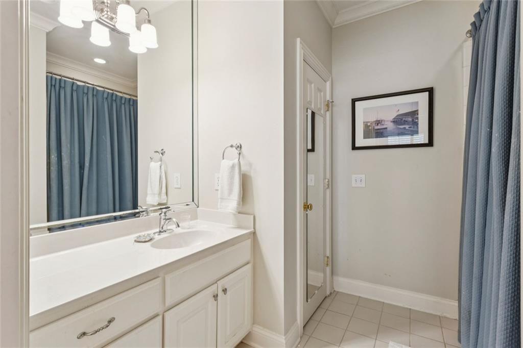 3005 Ranch Road Southeast Atlanta, GA 30339 - Photo 43 of 57 a bathroom with a sink vanity and a mirror