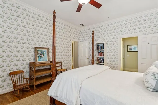 a bathroom with a sink a toilet and shower curtain