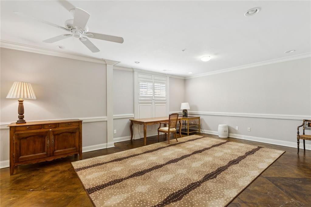 3005 Ranch Road Southeast Atlanta, GA 30339 - Photo 50 of 57 a bedroom with a bed and a chandelier