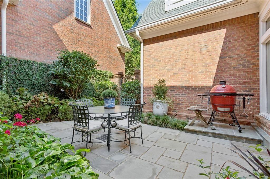 3005 Ranch Road Southeast Atlanta, GA 30339 - Photo 54 of 57 a view of a tables and chairs in back yard of the house