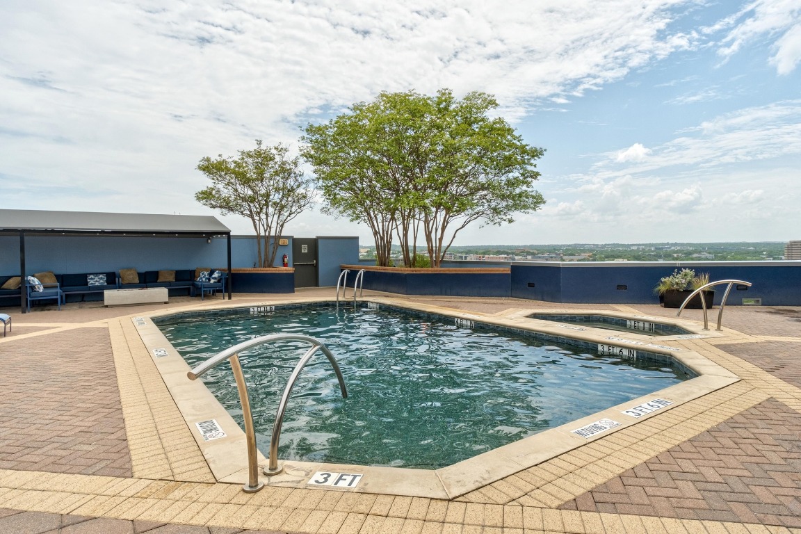 54 Rainey Street, Unit 1018 Austin, TX 78701 - Photo 17 of 33 a view of a swimming pool with a patio