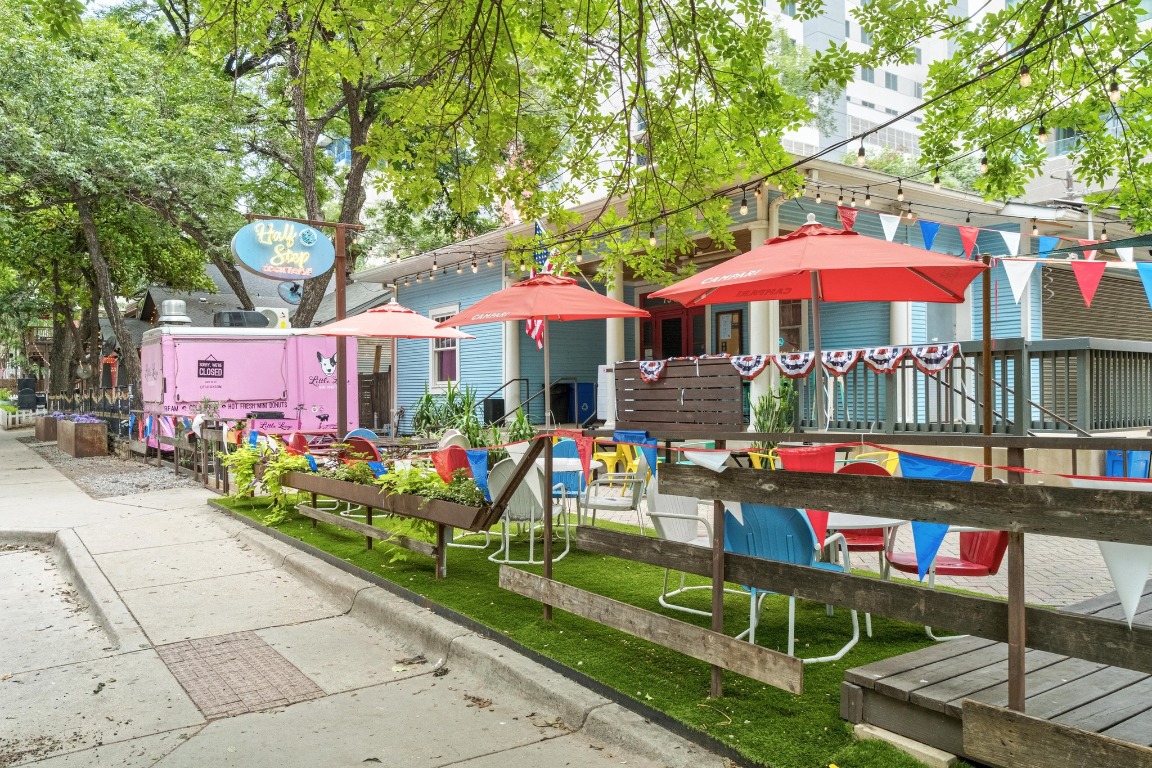 54 Rainey Street, Unit 1018 Austin, TX 78701 - Photo 28 of 33 an outdoor space with seating