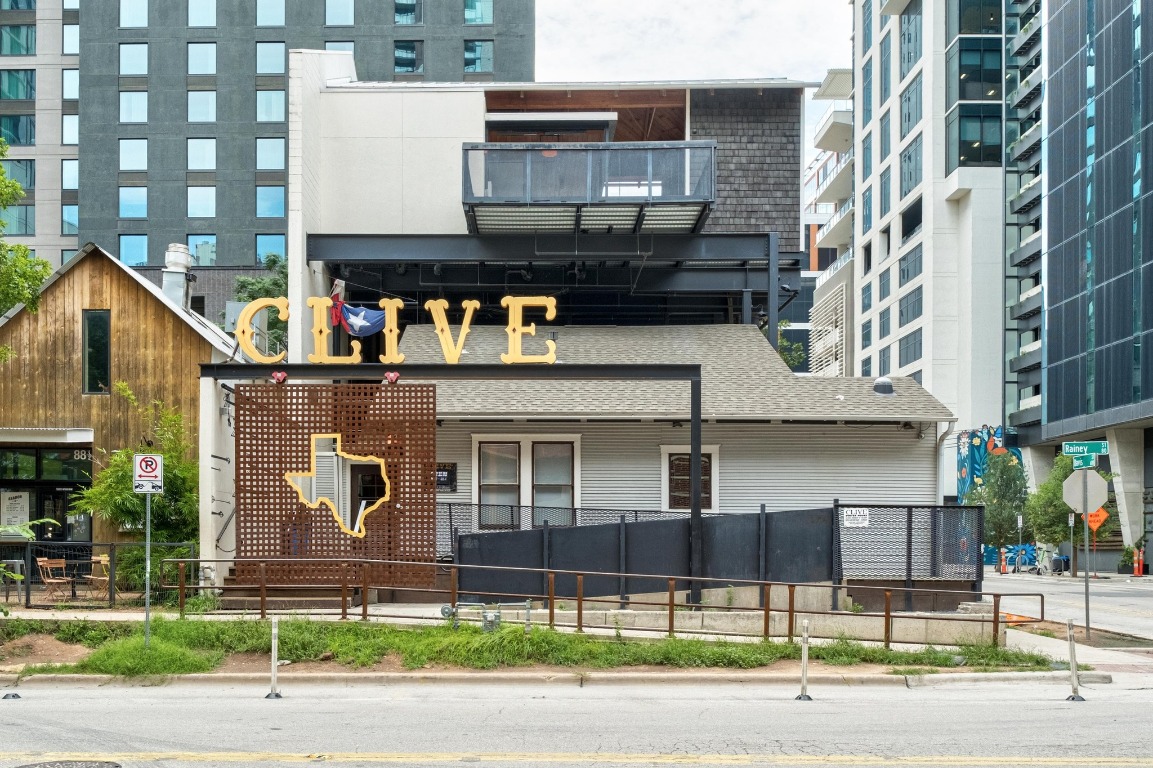54 Rainey Street, Unit 1018 Austin, TX 78701 - Photo 30 of 33 a view of a brick building with many windows
