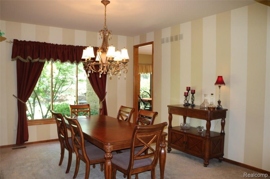 1983 Blue Grass Court Rochester, MI 48306 - Photo 19 of 46 FROM THE KITCHEN YOU ENTER THE LARGE FORMAL DINING ROOM (13 X 14)