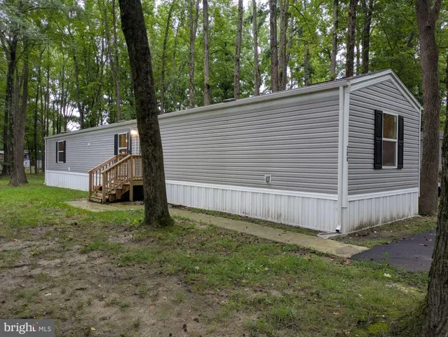 a view of a back yard of the house
