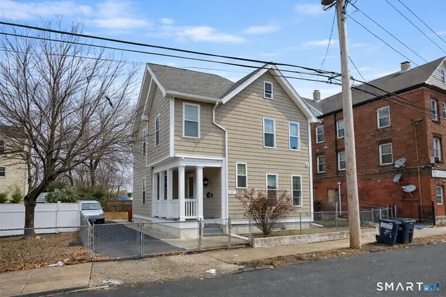 a view of a house with a patio