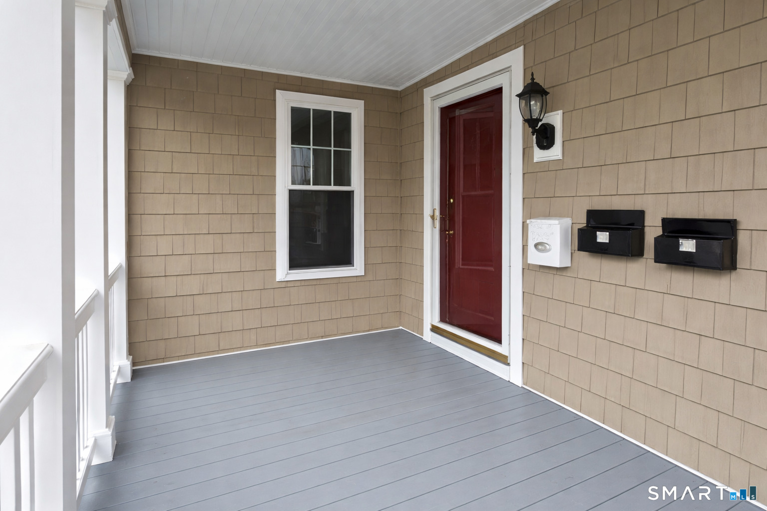 687 Hallett Street, Unit 1 Bridgeport, CT 06608 - Photo 3 of 5 a view of a entryway door of the house