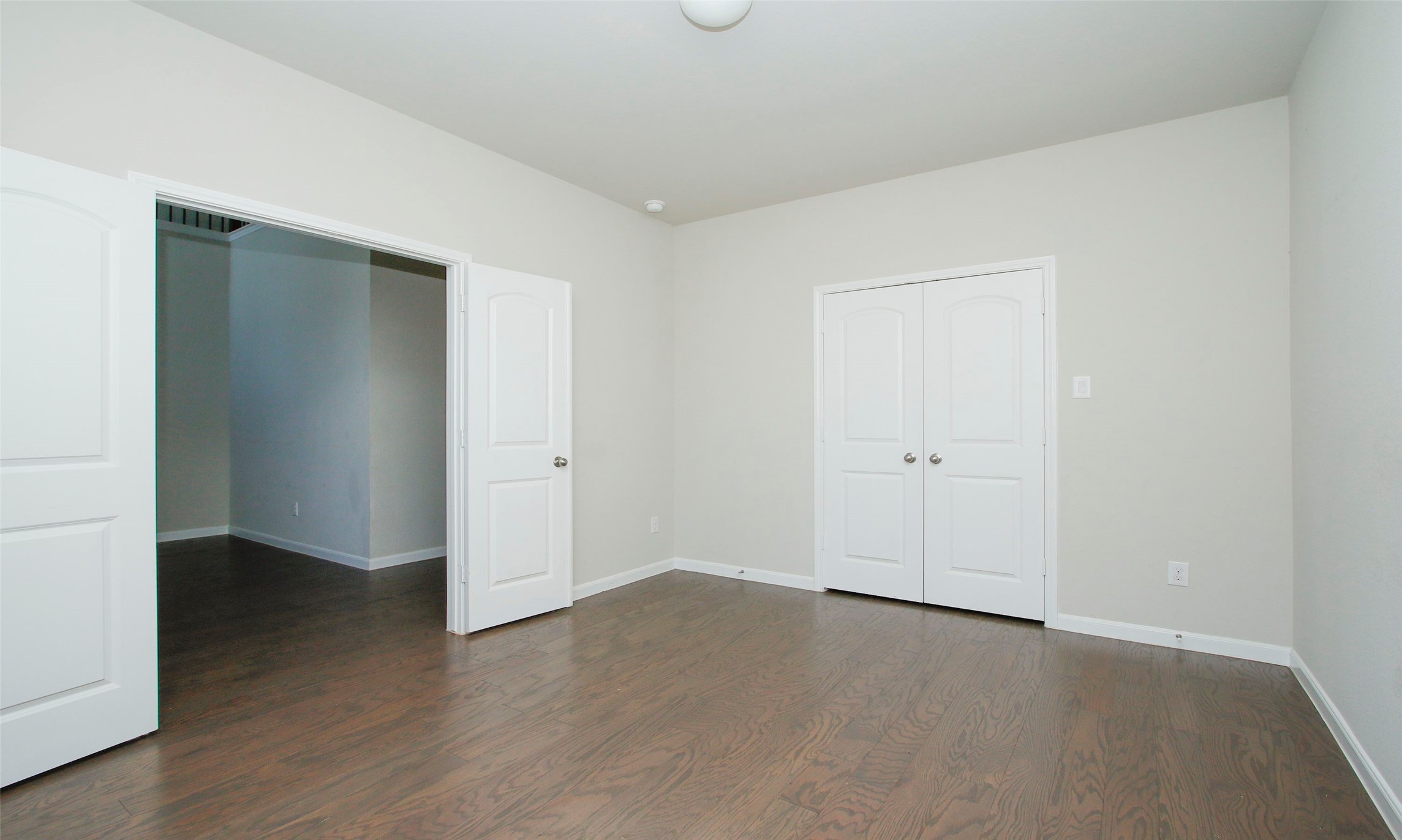 14120 Sand Ridge Court Conroe, TX 77384 - Photo 7 of 43 an empty room with wooden floor and closet