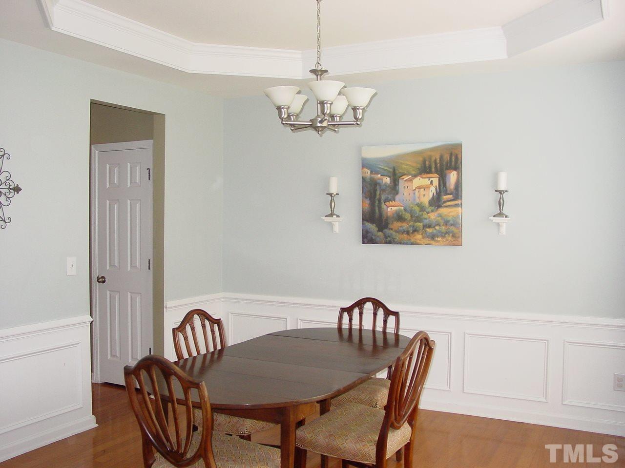 7724 Jackson Dane Drive Raleigh, NC 27613 - Photo 3 of 25 Hardwood floors, brushed nickel hardware, trey ceiling