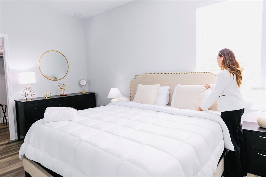 189 Statler Street Port Charlotte, FL 33954 - Photo 25 of 32 a bedroom with bed and wooden floor