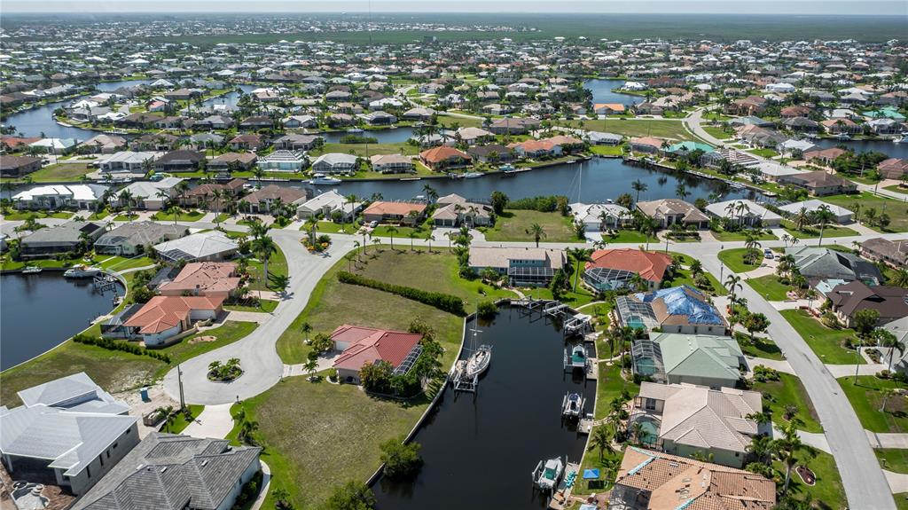 1423 Grebe Court Punta Gorda, FL 33950 - Photo 6 of 7 an aerial view of residential houses with outdoor space