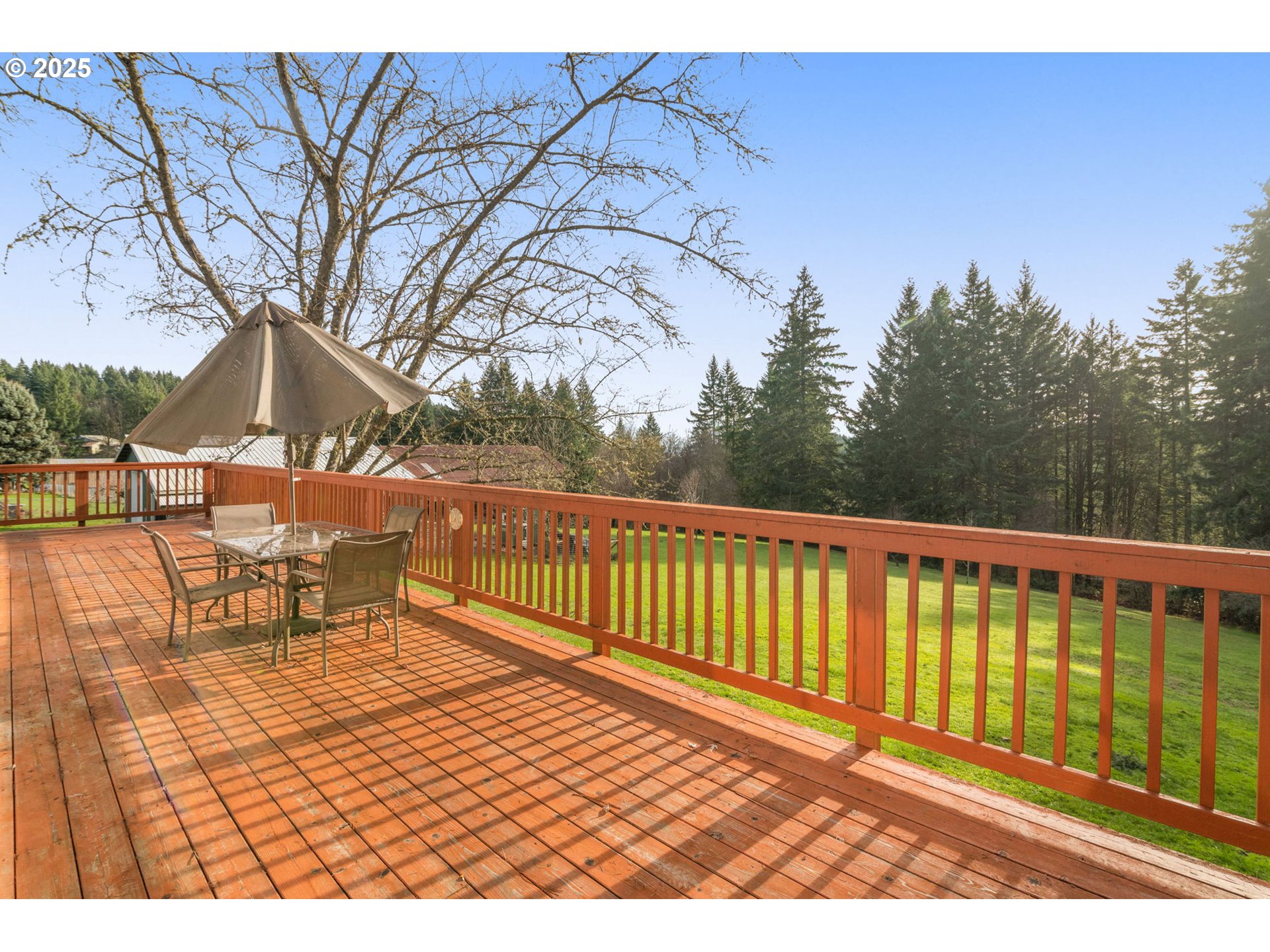 32198 Cater Road Warren, OR 97053 - Photo 18 of 48 a view of a chairs and bench on the terrace