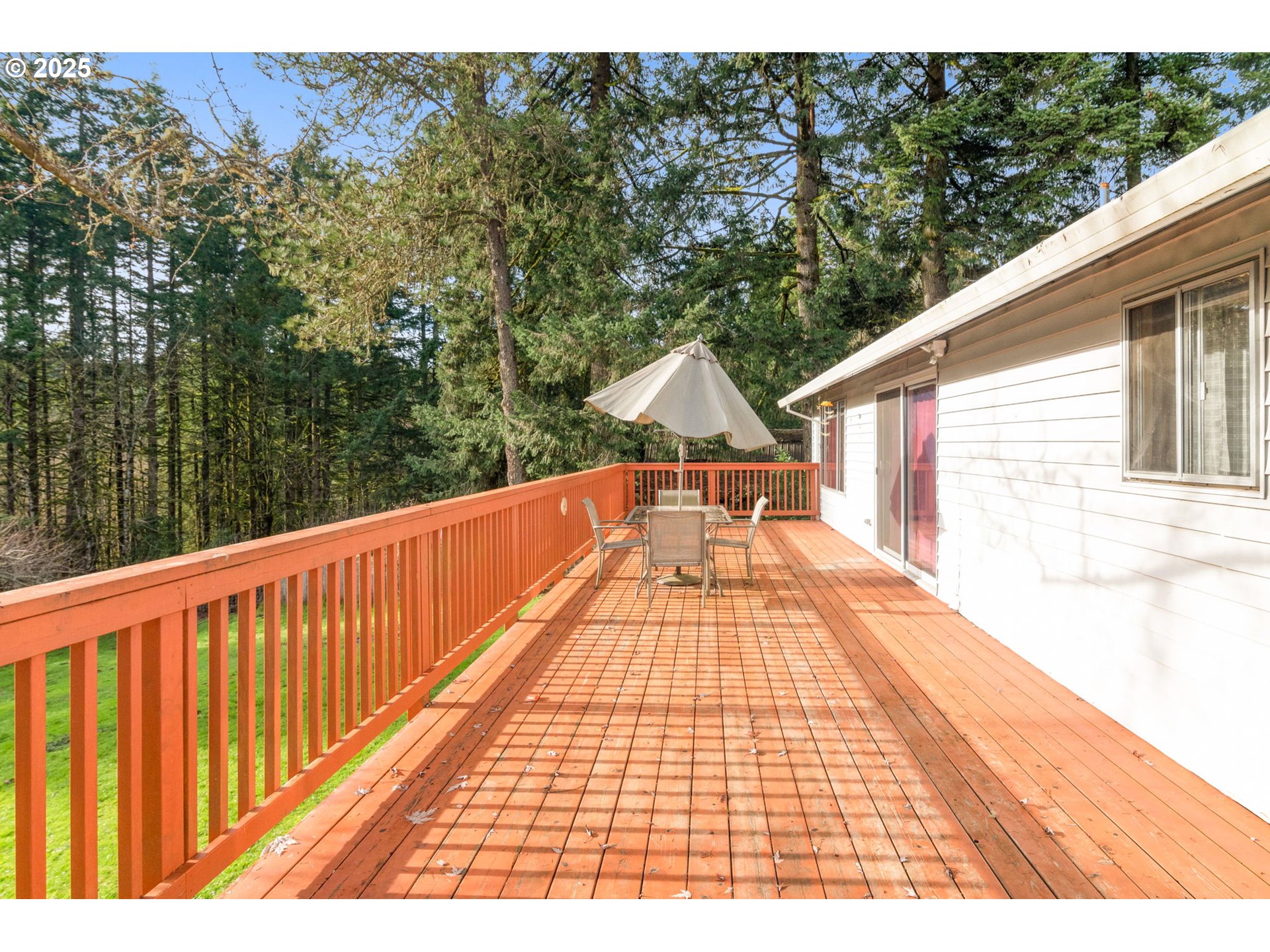 32198 Cater Road Warren, OR 97053 - Photo 19 of 48 a view of balcony with wooden floor and fence