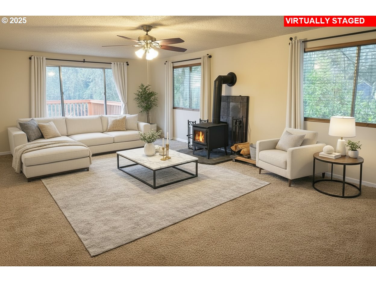 32198 Cater Road Warren, OR 97053 - Photo 2 of 48 a living room with furniture and a large window