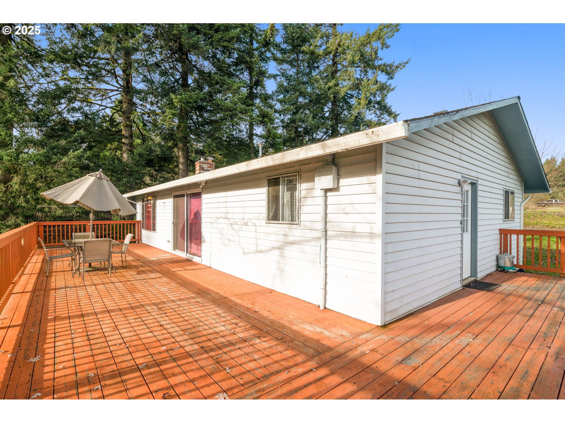 32198 Cater Road Warren, OR 97053 - Photo 23 of 48 a front view of a house with a yard