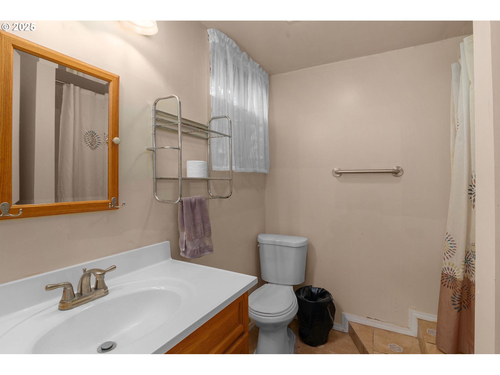 32198 Cater Road Warren, OR 97053 - Photo 44 of 48 a bathroom with a sink a toilet and mirror
