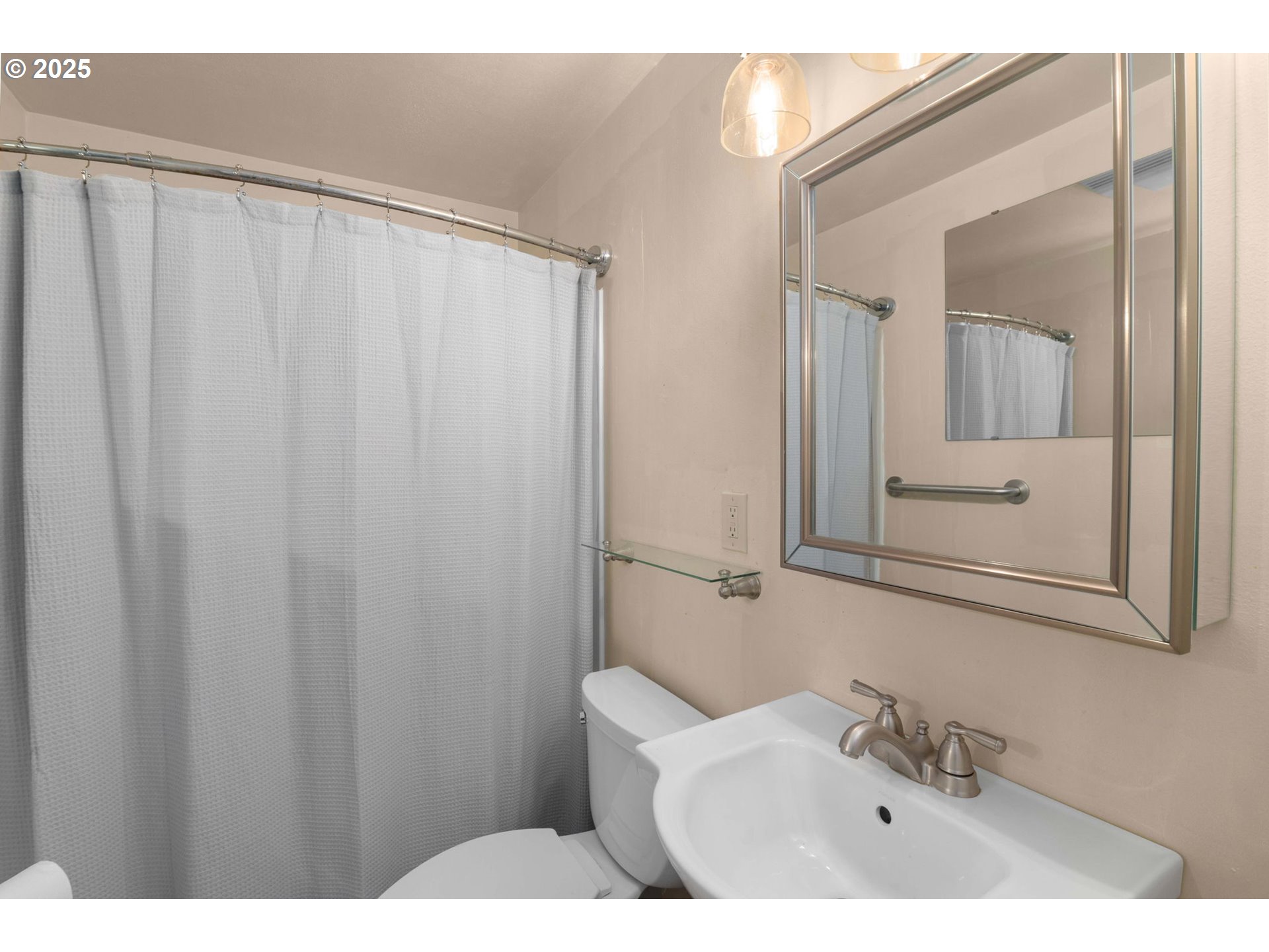 32198 Cater Road Warren, OR 97053 - Photo 48 of 48 a bathroom with a sink and a mirror